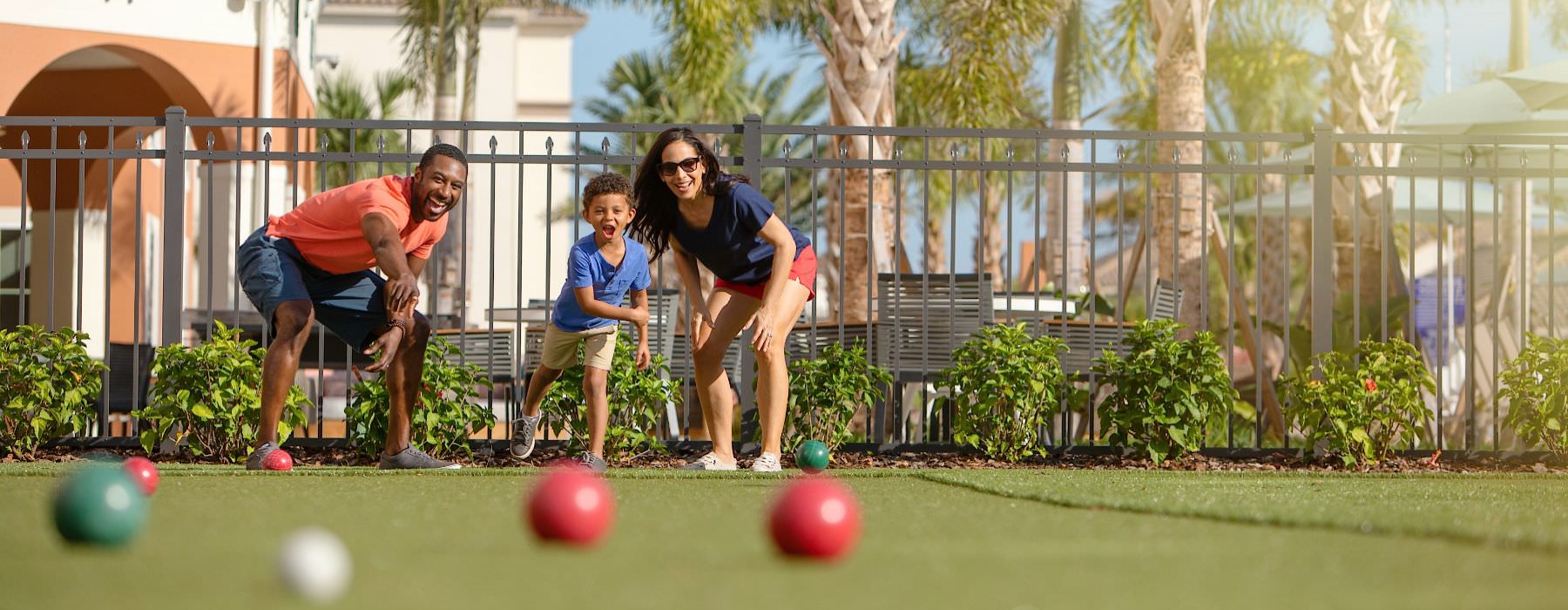 family playing bocce ball